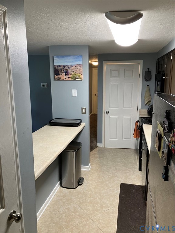 7608 Portadown Court, Unit 2602 Henrico, VA 23228 - Photo 7 of 37 a room with a table chairs and a walk in closet