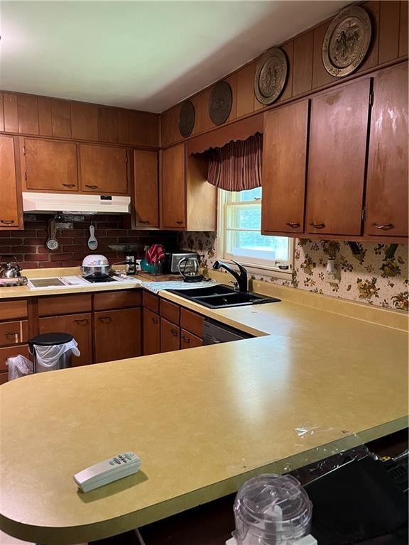4050 Welcome All Terrace Atlanta, GA 30349 - Photo 2 of 10 a kitchen with a sink and a stove top oven
