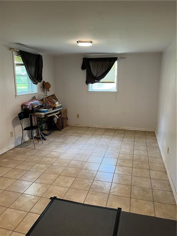 4050 Welcome All Terrace Atlanta, GA 30349 - Photo 6 of 10 a living room with a couch and a coffee table