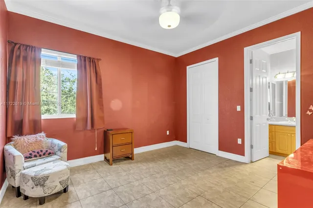 a bathroom with a granite countertop sink toilet a mirror and shower