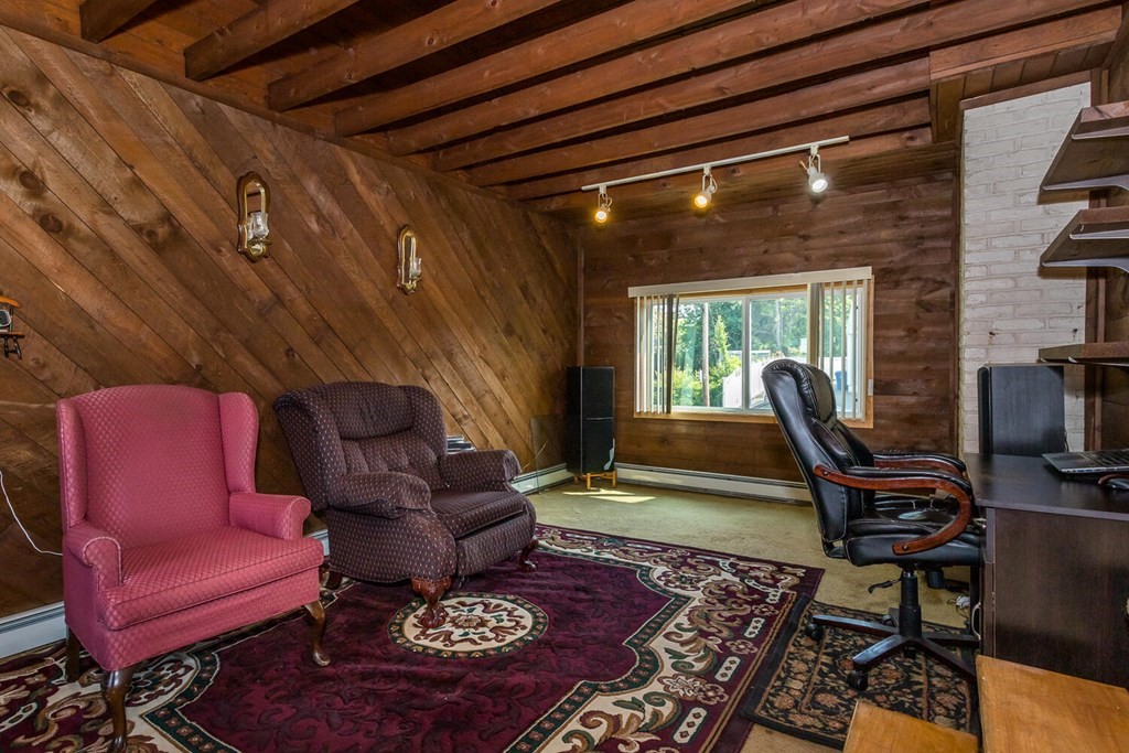 1 Desmond Road Randolph, MA 02368 - Photo 11 of 18 a living room with furniture a rug and a window
