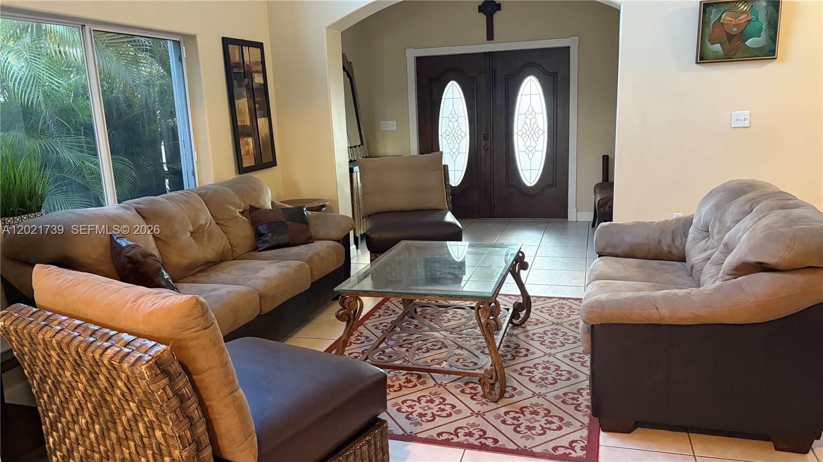 13553 Southwest 124th Avenue Road Miami, FL 33186 - Photo 6 of 31 a living room with furniture and a window