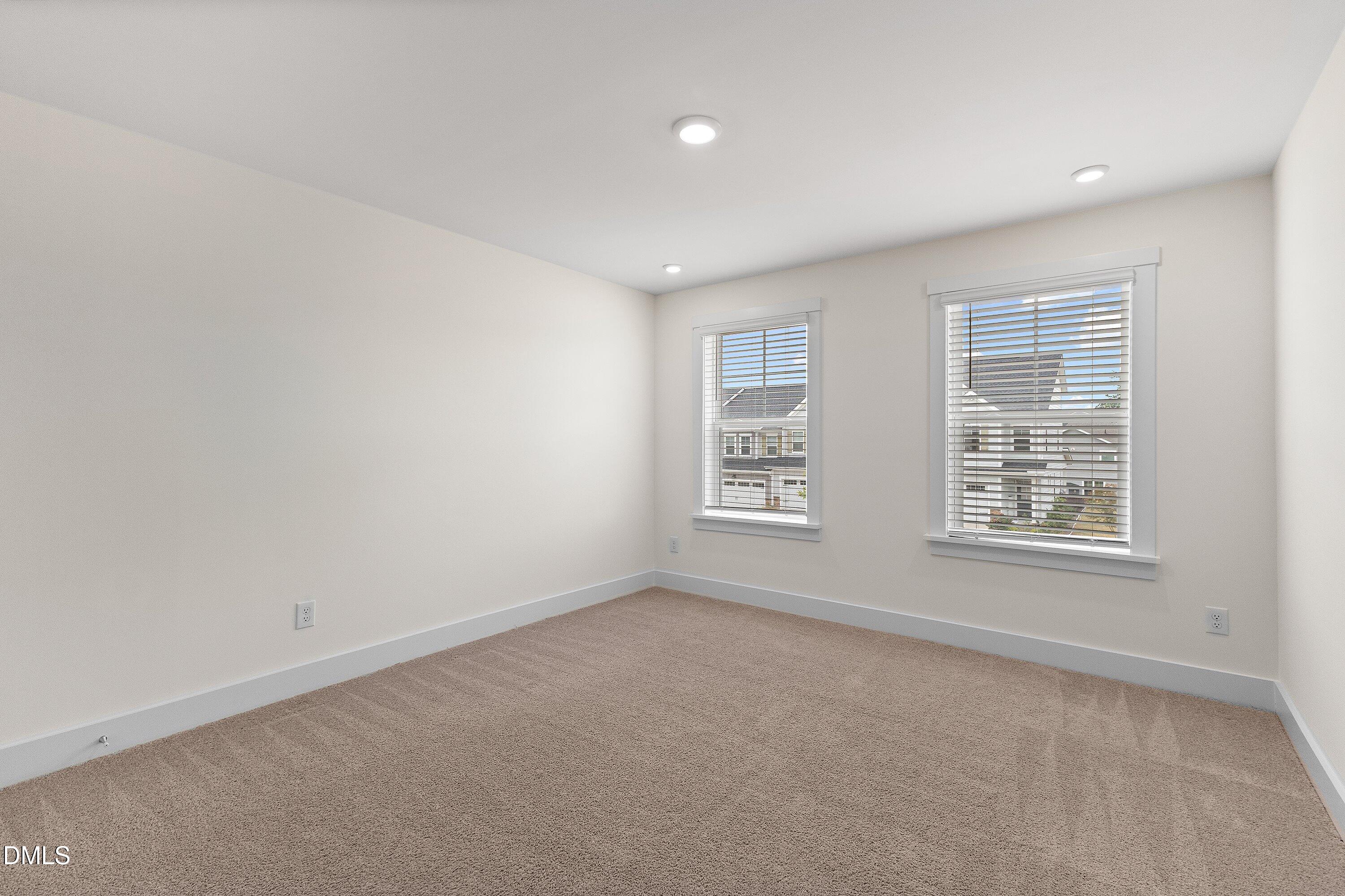 156 Sears Ridge Lane Morrisville, NC 27560 - Photo 32 of 49 an empty room with a window