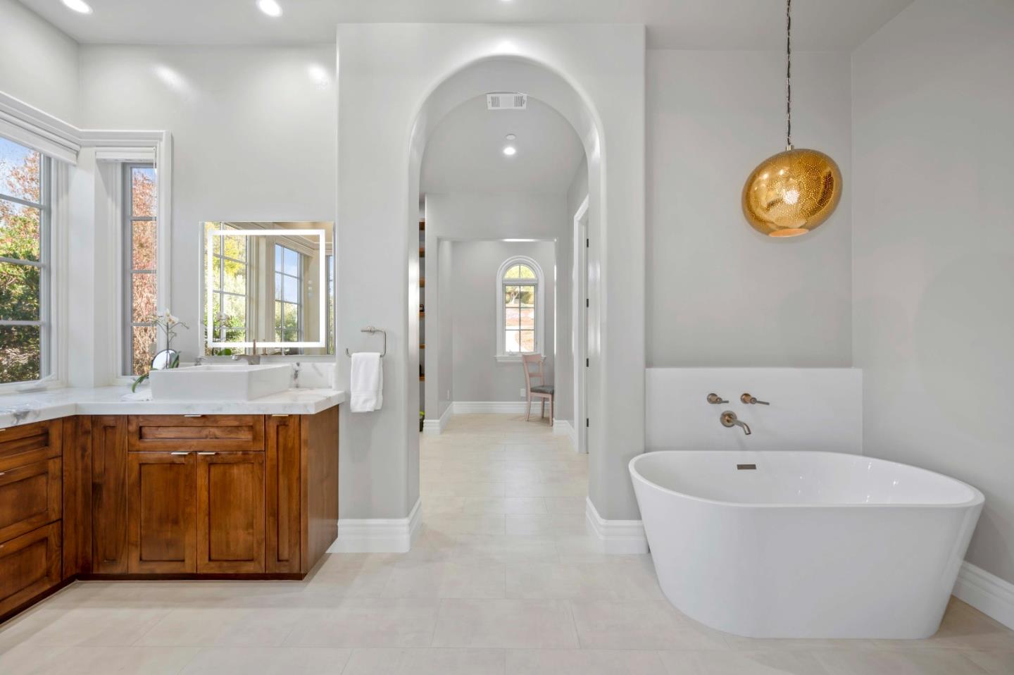 700 Tesoro Road Monterey, CA 93940 - Photo 11 of 47 a spacious bathroom with a tub sink and mirror