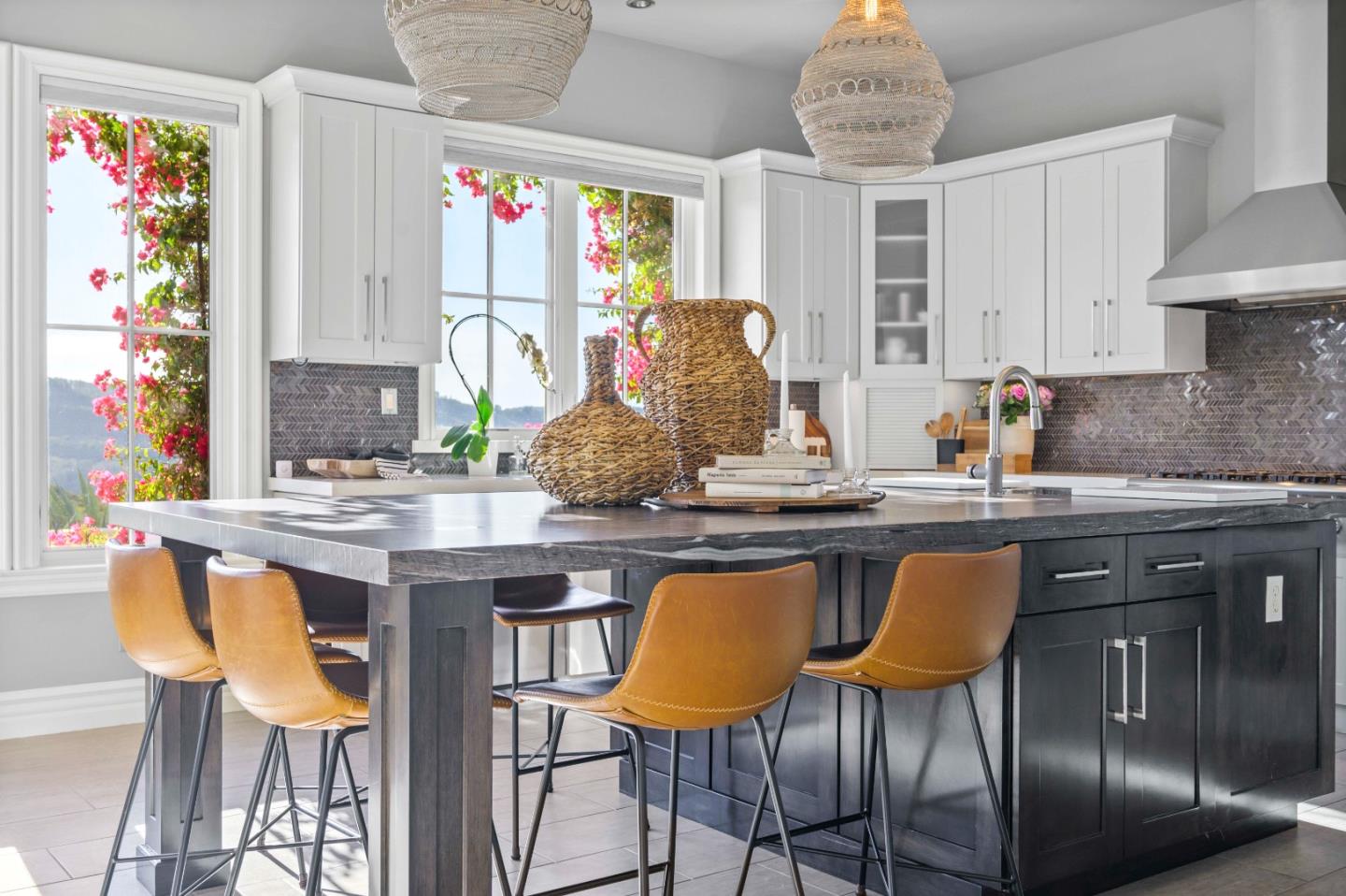 700 Tesoro Road Monterey, CA 93940 - Photo 18 of 47 a kitchen with stainless steel appliances granite countertop a table chairs stove and sink