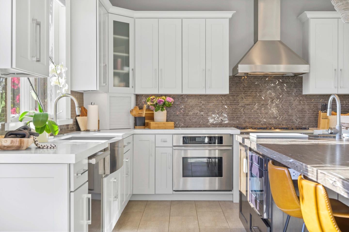 700 Tesoro Road Monterey, CA 93940 - Photo 19 of 47 a kitchen with stainless steel appliances white cabinets and a sink