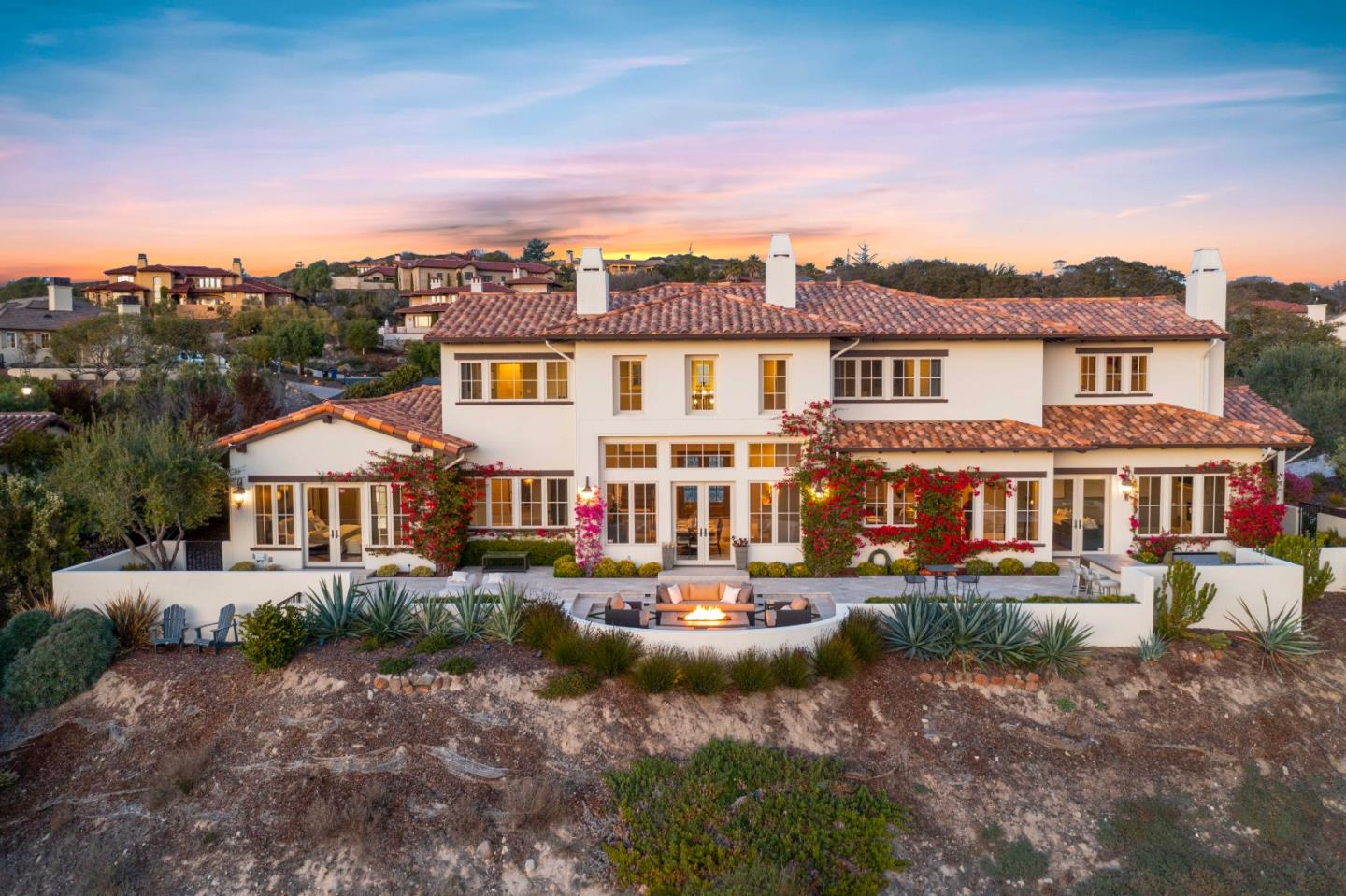 700 Tesoro Road Monterey, CA 93940 - Photo 2 of 47 a front view of a house with a yard