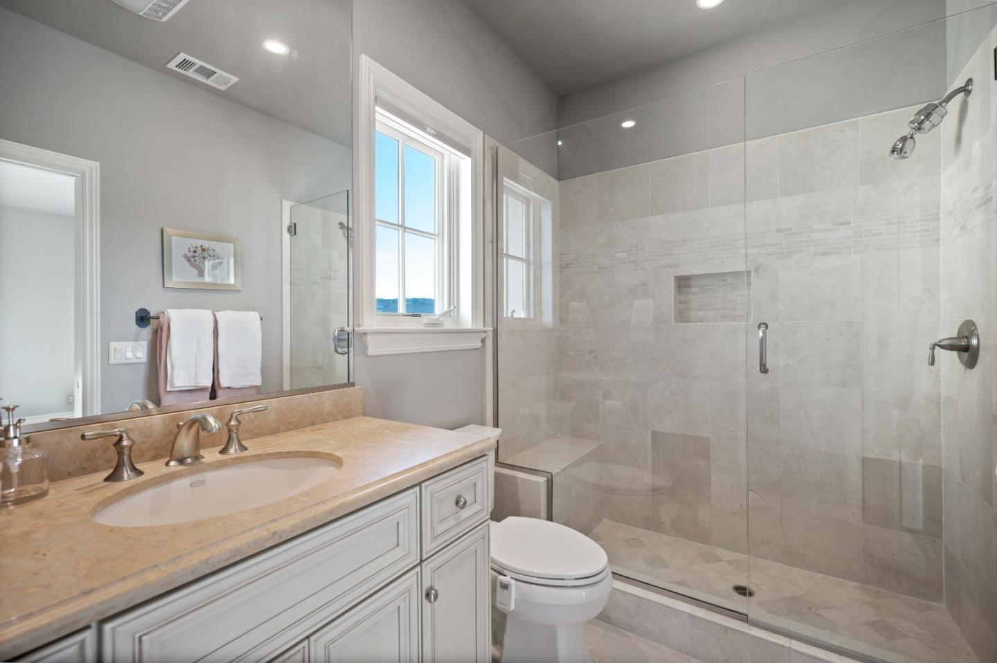 700 Tesoro Road Monterey, CA 93940 - Photo 34 of 47 a bathroom with a granite countertop sink a toilet and shower