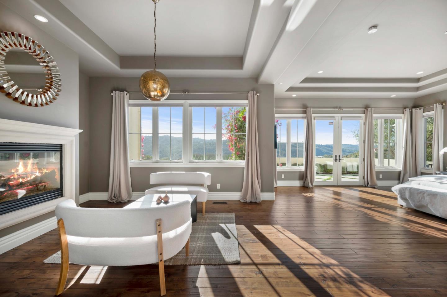 700 Tesoro Road Monterey, CA 93940 - Photo 8 of 47 a living room with furniture fireplace and a large window