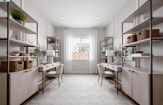 a workspace with furniture and window