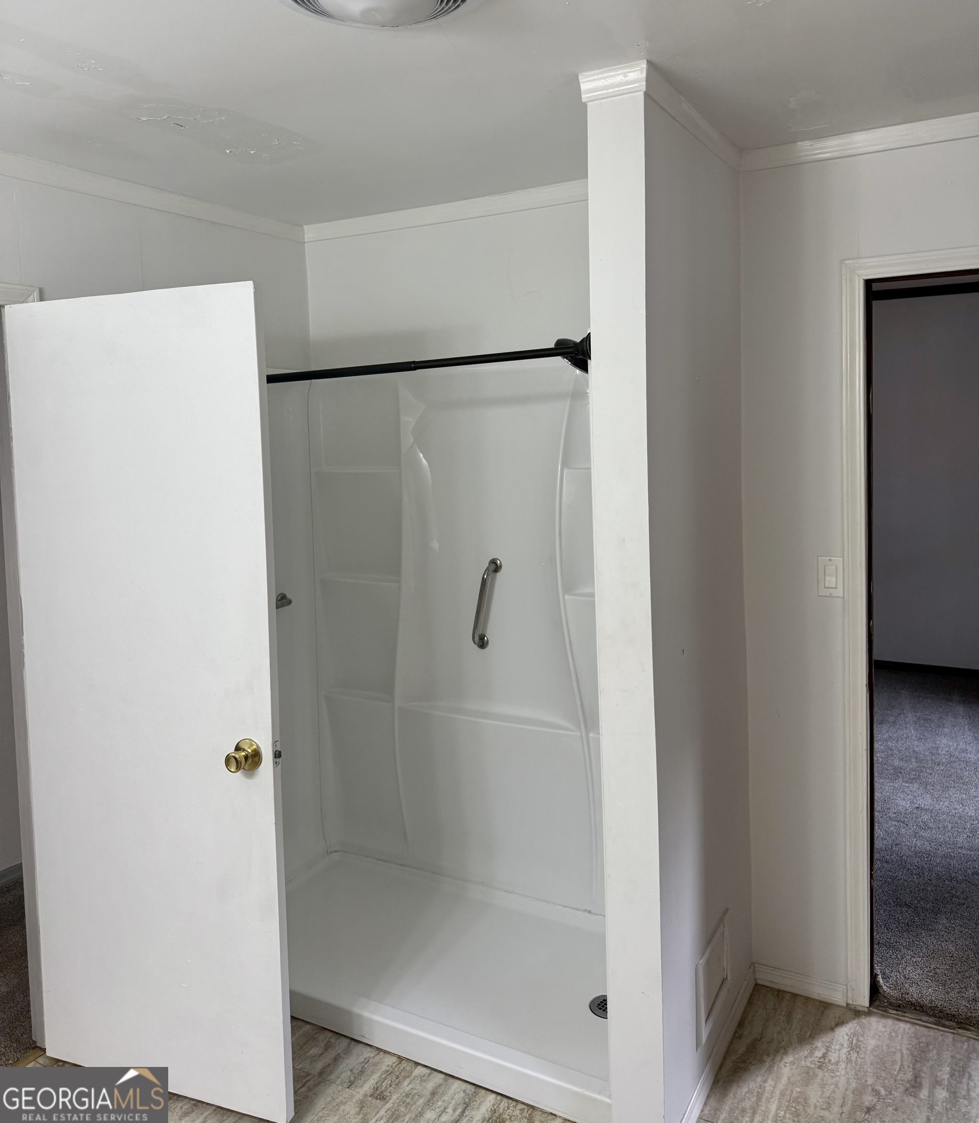 134 Raymond Street Summerville, GA 30747 - Photo 17 of 22 a bathroom with a shower