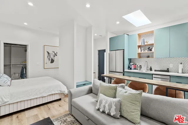 a kitchen with a stove and a microwave