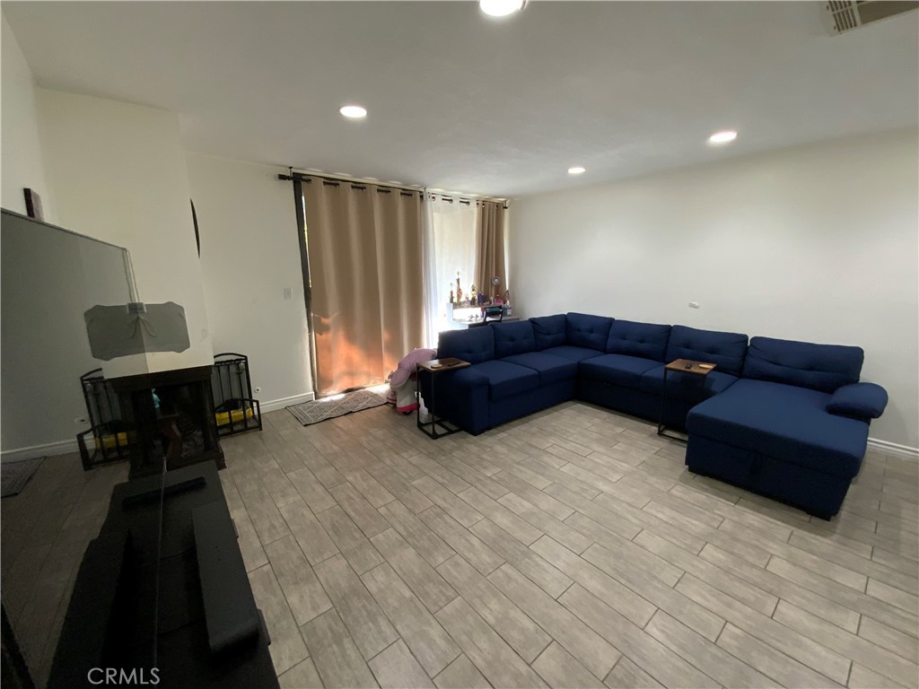 4140 Workman Mill Road, Unit 172 Whittier, CA 90601 - Photo 3 of 21 a living room with furniture and a couch