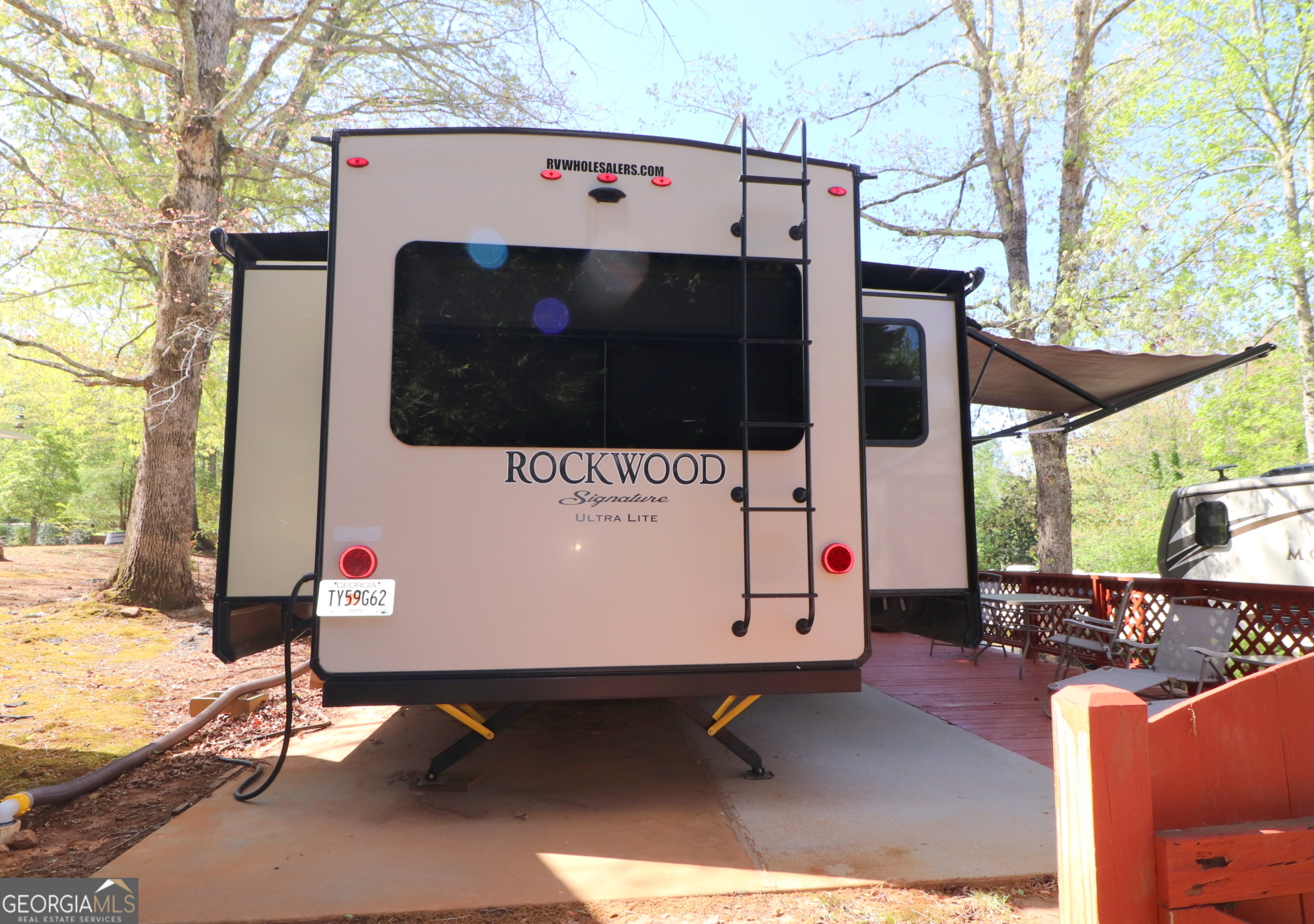 148 Tip Top Circle Cleveland, GA 30528 - Photo 5 of 32 a view of outdoor space and barbecue grill
