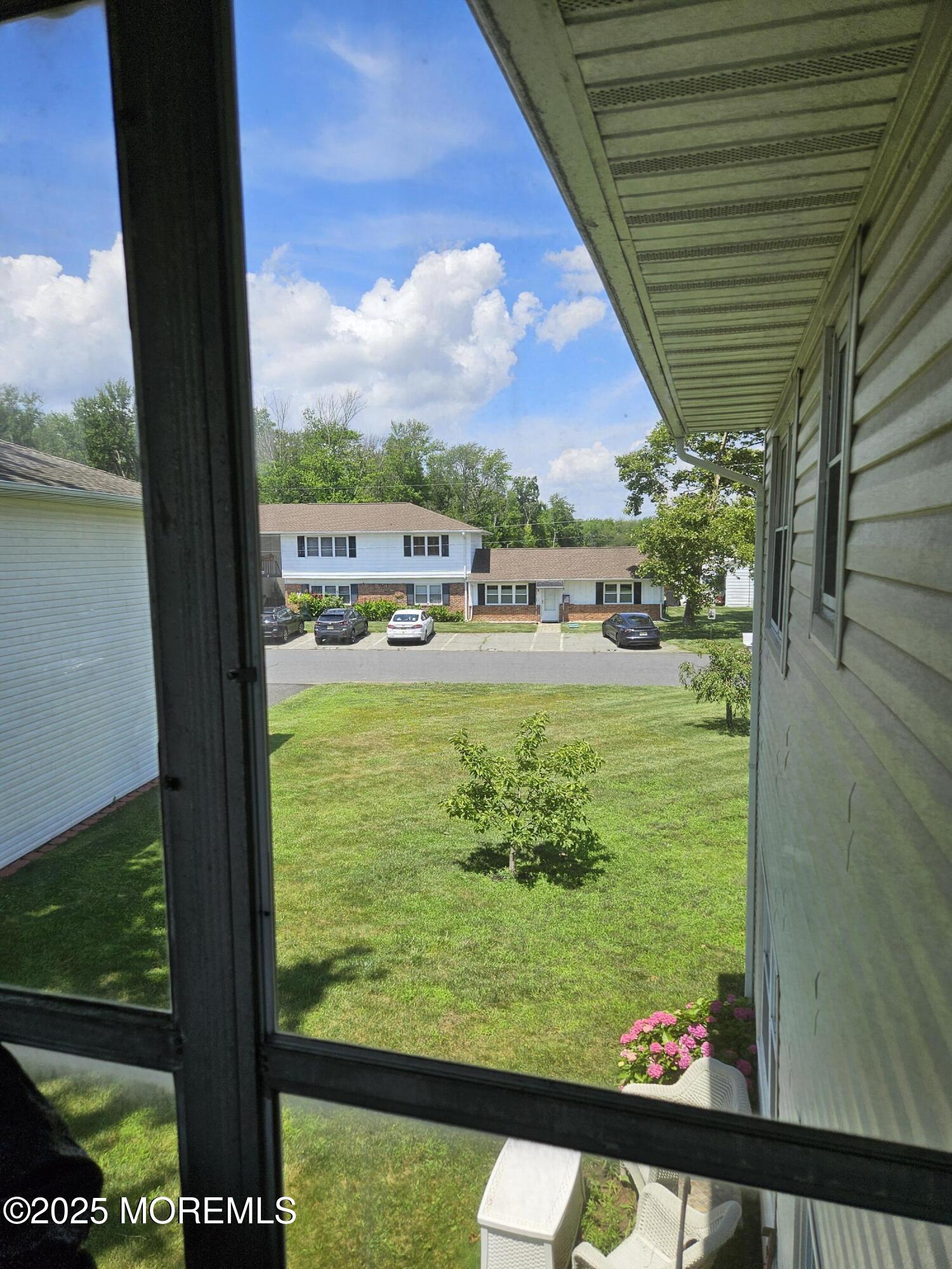 72 Haven Drive, Unit 500 Matawan, NJ 07747 - Photo 13 of 19 a view of swimming pool from a balcony