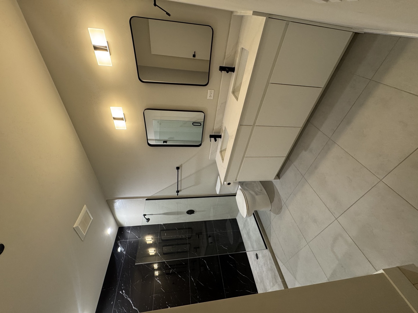 503 East Pershing Road, Unit 301 Chicago, IL 60653 - Photo 14 of 21 a bathroom with a sink and mirror