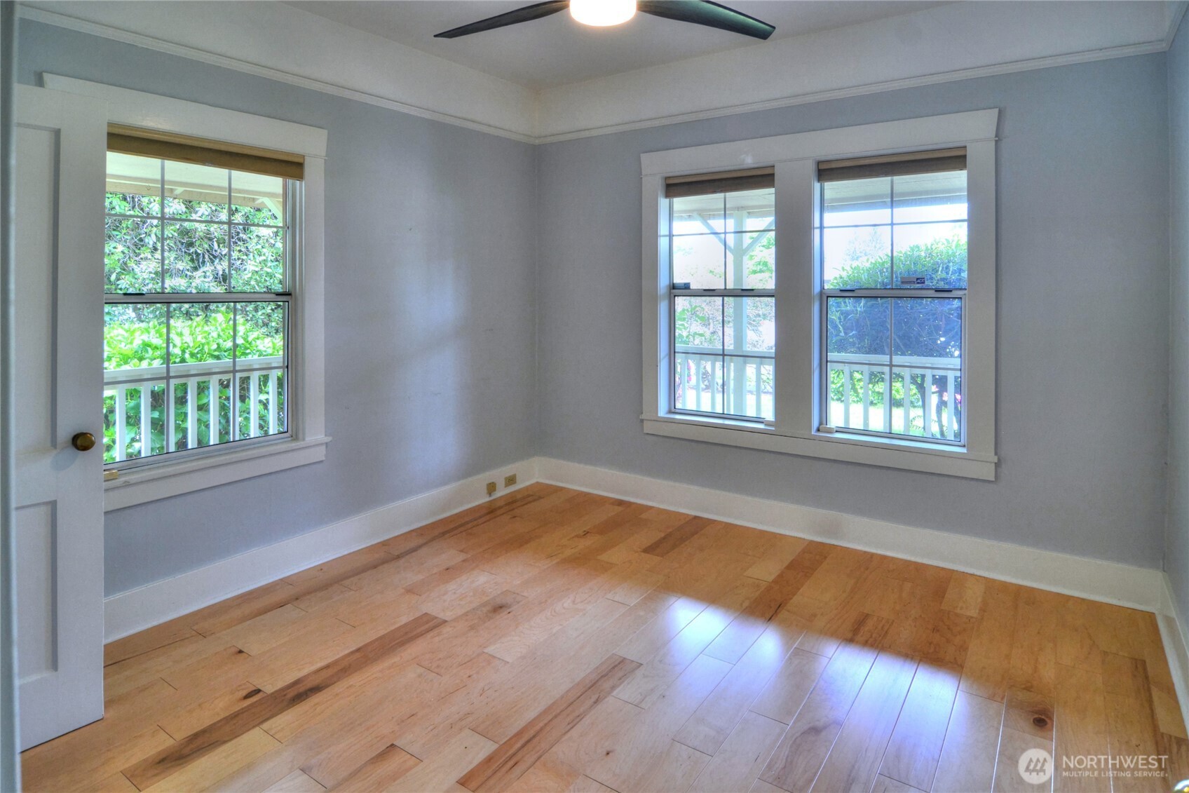 654 West Main Street Monroe, WA 98272 - Photo 11 of 40 a view of an empty room with wooden floor and a window