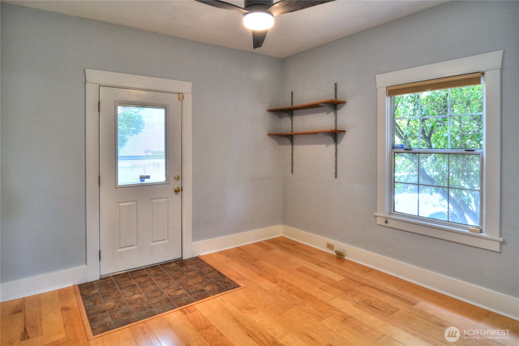 654 West Main Street Monroe, WA 98272 - Photo 19 of 40 a view of a room with a ceiling fan and window