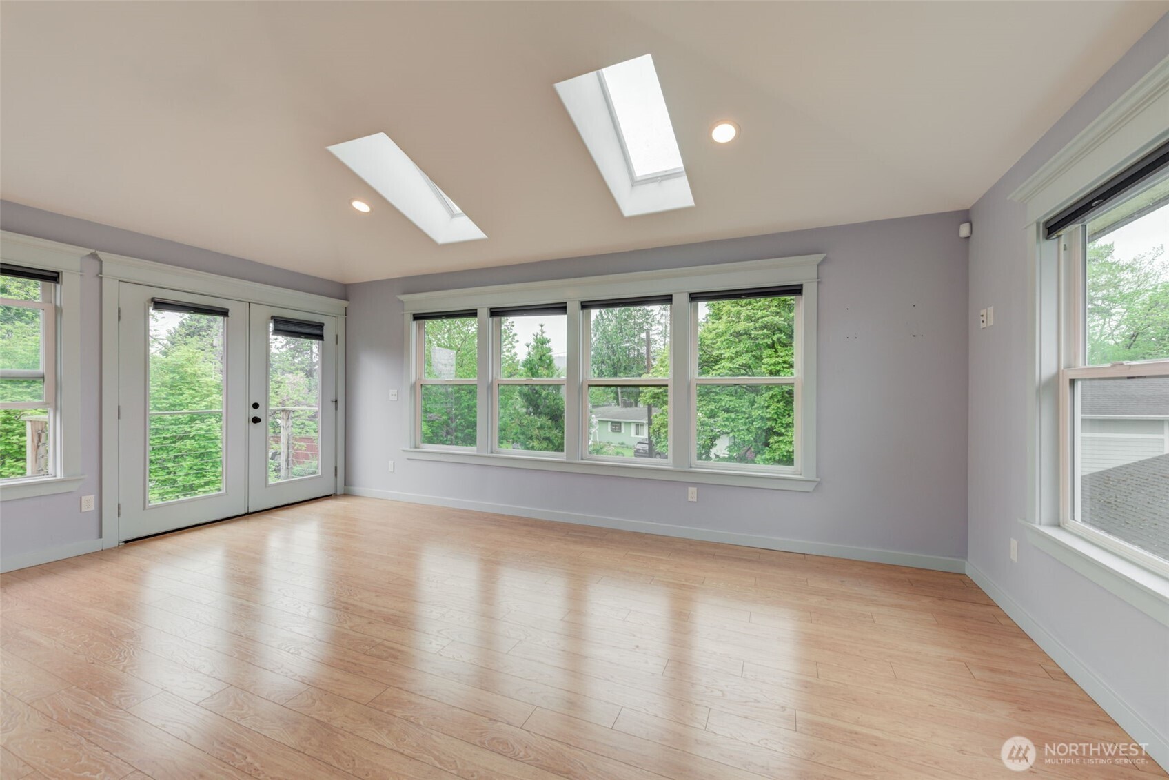 654 West Main Street Monroe, WA 98272 - Photo 25 of 40 a view of empty room with wooden floor and fan