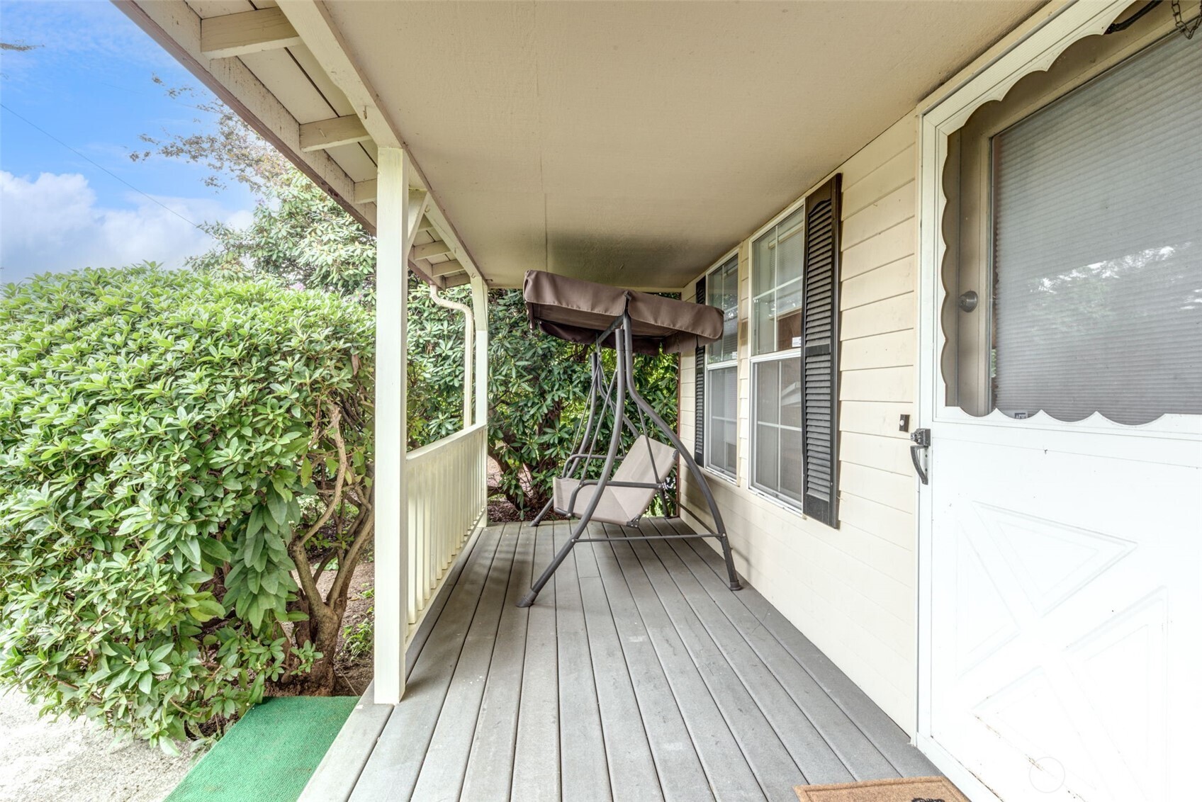 654 West Main Street Monroe, WA 98272 - Photo 5 of 40 a view of balcony with wooden floor and outdoor seating