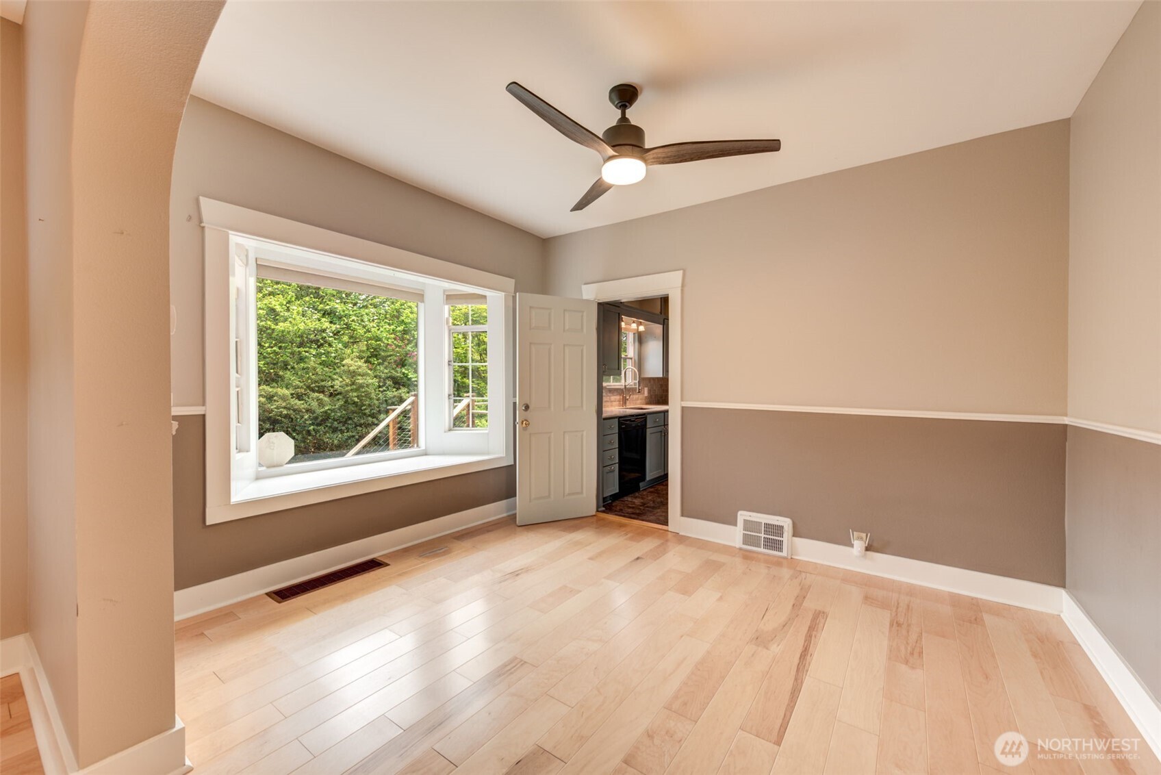 654 West Main Street Monroe, WA 98272 - Photo 10 of 40 a view of a livingroom with a ceiling fan and a window