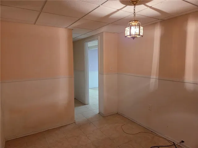 a view of a refrigerator in a room