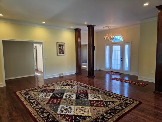 a large hall with yard and wooden floor