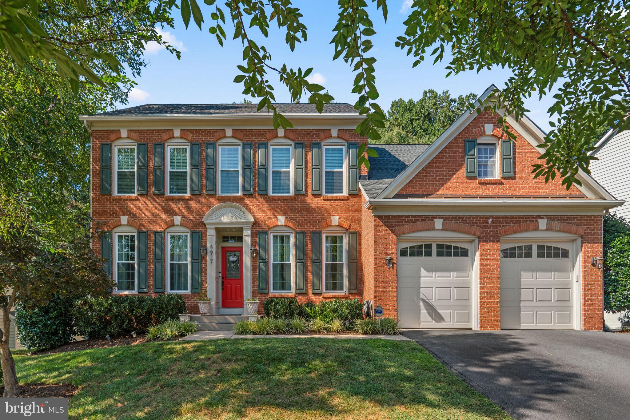 4617 Brightwood Road Olney, MD 20832 - Photo 2 of 58 front view of a house with a yard