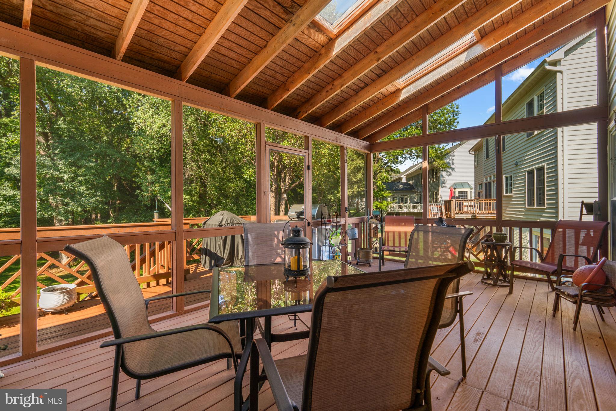 4617 Brightwood Road Olney, MD 20832 - Photo 50 of 58 a view of a dining room with furniture window and outside view
