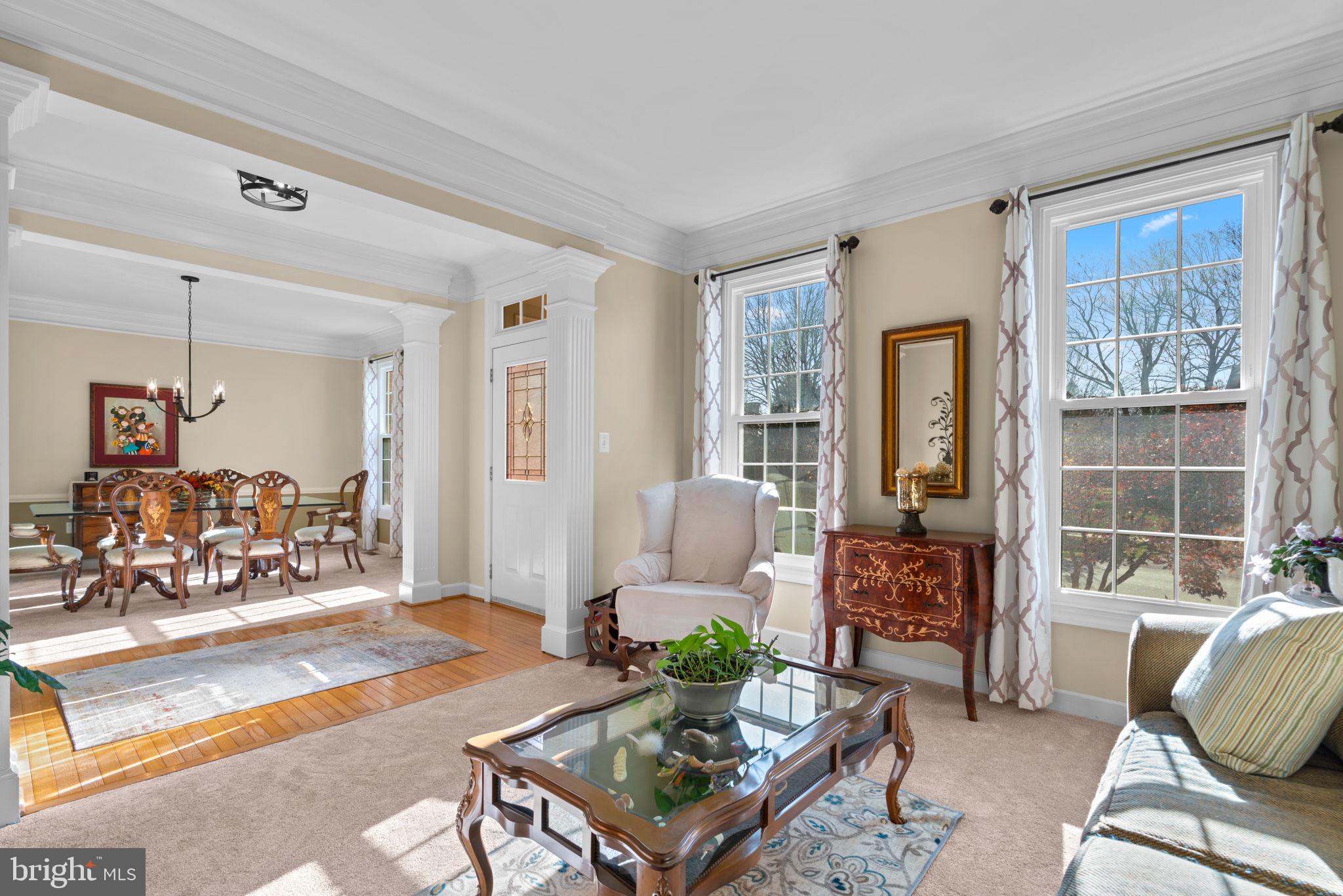 4617 Brightwood Road Olney, MD 20832 - Photo 5 of 58 a living room with furniture and a large window