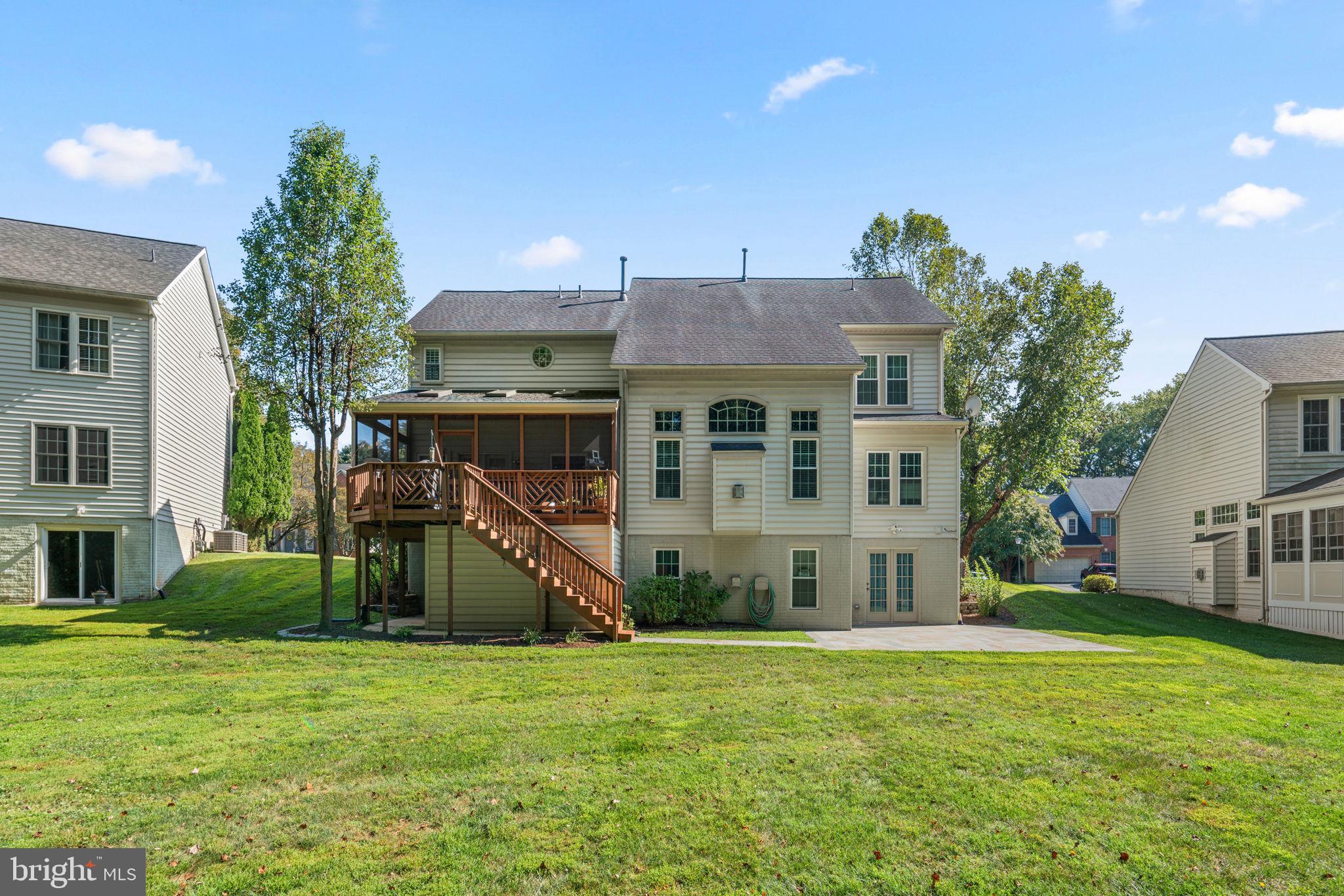 4617 Brightwood Road Olney, MD 20832 - Photo 55 of 58 a view of a house with a backyard