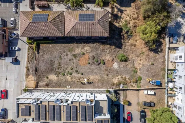 a view of a street with houses