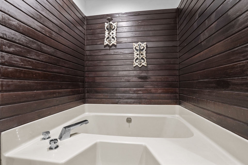 500 Hancock Street Fall River, MA 02721 - Photo 13 of 33 a bathroom with a bathtub