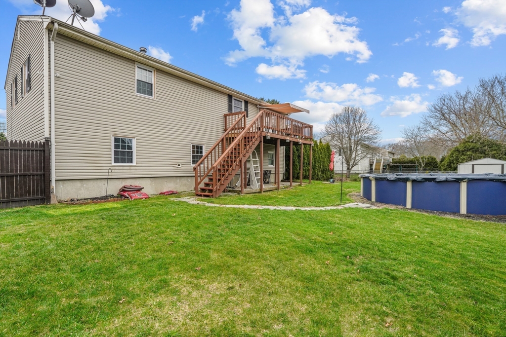 500 Hancock Street Fall River, MA 02721 - Photo 29 of 33 a view of a backyard with a garden