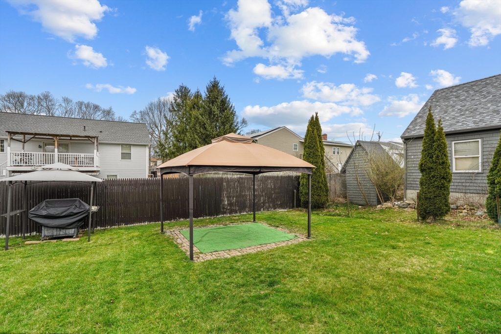 500 Hancock Street Fall River, MA 02721 - Photo 31 of 33 a backyard of a house with lots of green space