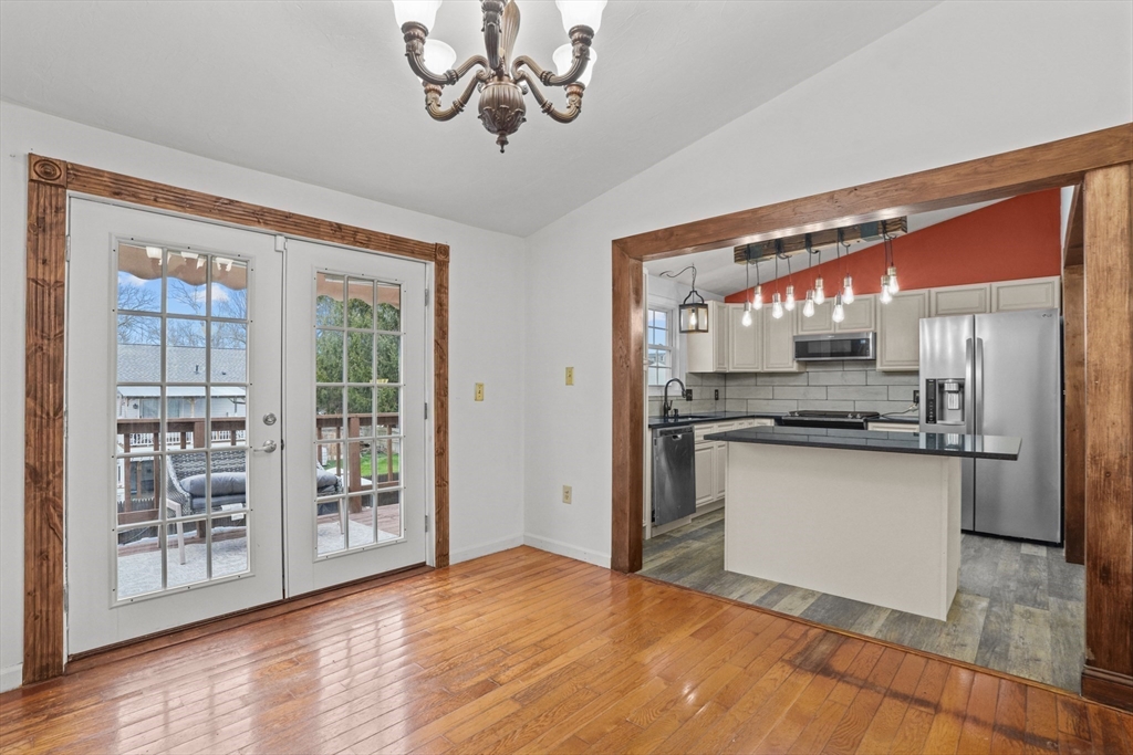 500 Hancock Street Fall River, MA 02721 - Photo 5 of 33 a kitchen with a refrigerator and a sink