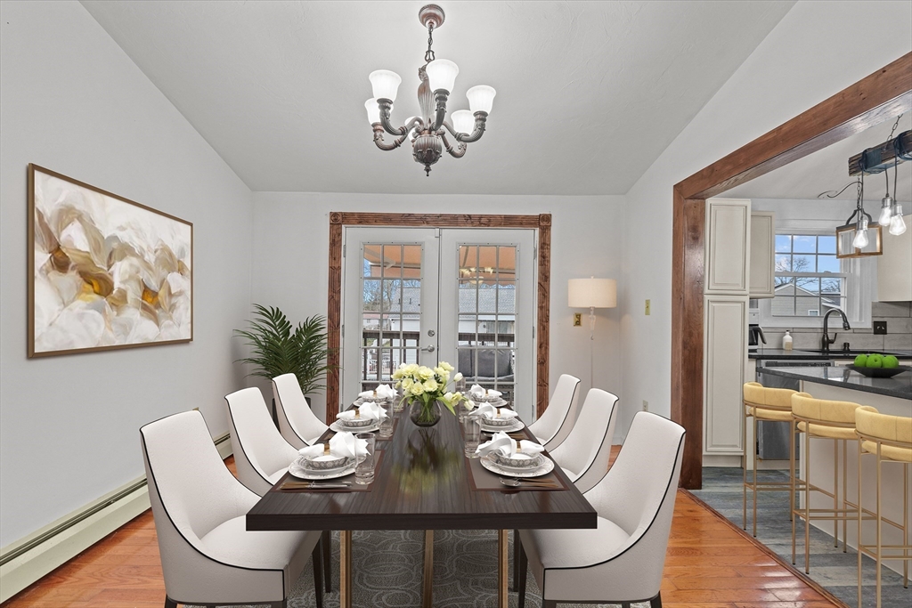 500 Hancock Street Fall River, MA 02721 - Photo 7 of 33 a view of a dining room with furniture wooden floor and chandelier