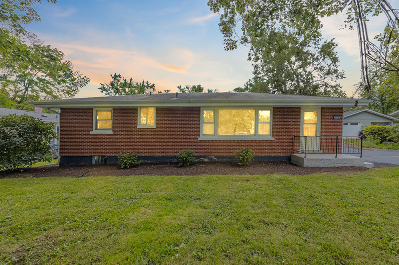 752 Rolling Drive Lisle, IL 60532 - Photo 2 of 37 a front view of a house with garden