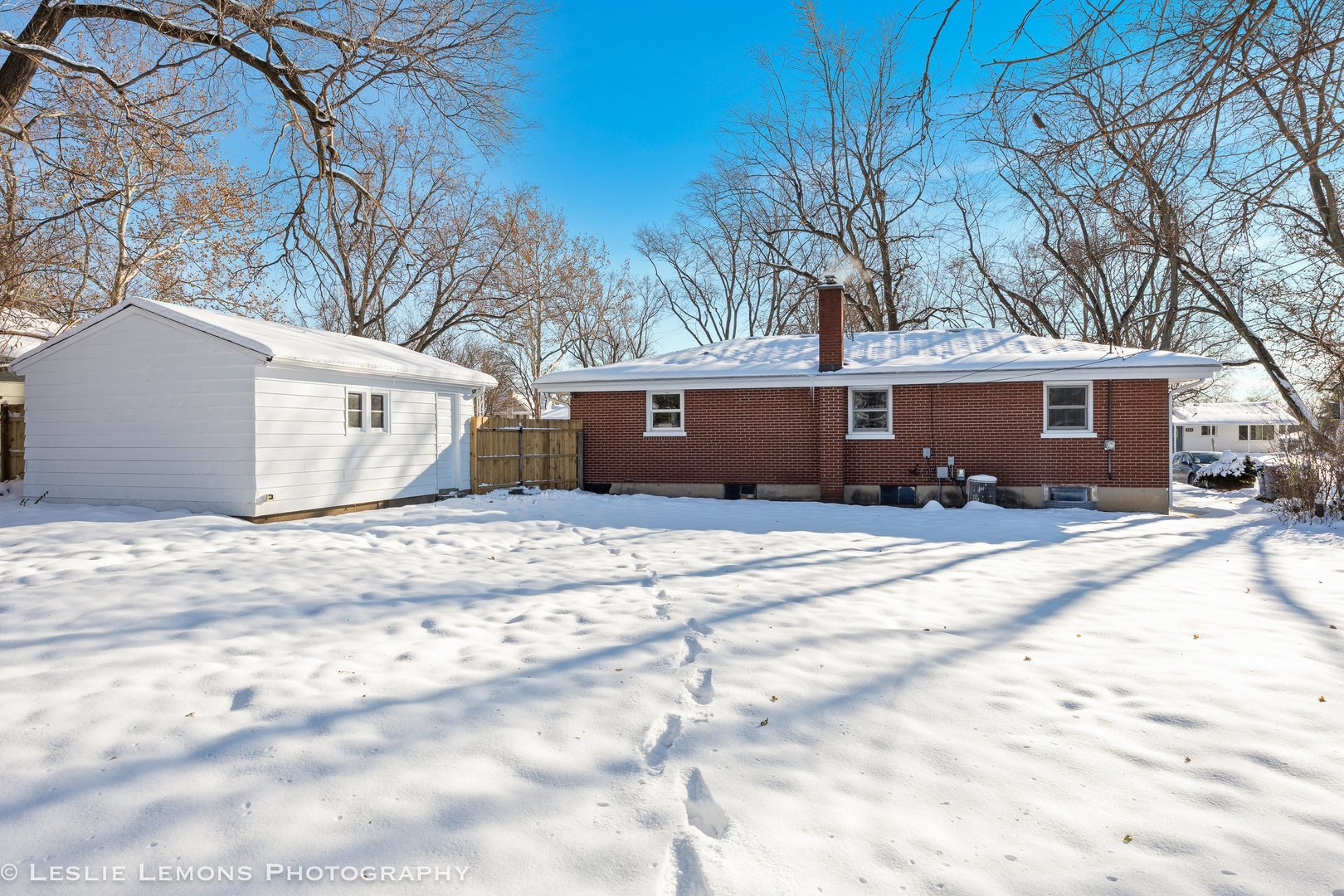 752 Rolling Drive Lisle, IL 60532 - Photo 31 of 37 a front view of a house with a yard and garage