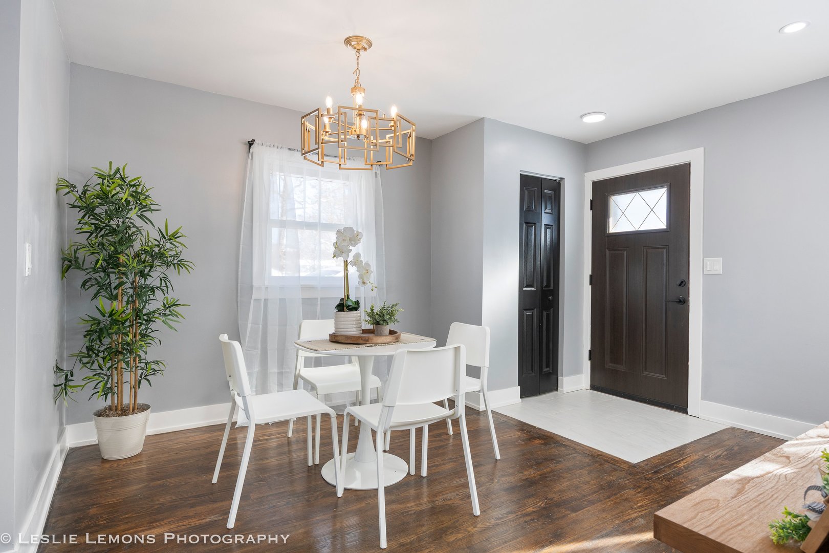 752 Rolling Drive Lisle, IL 60532 - Photo 8 of 37 a view of a dining room with furniture window and wooden floor