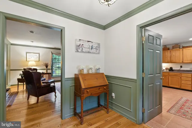 a room with furniture and a wooden floor