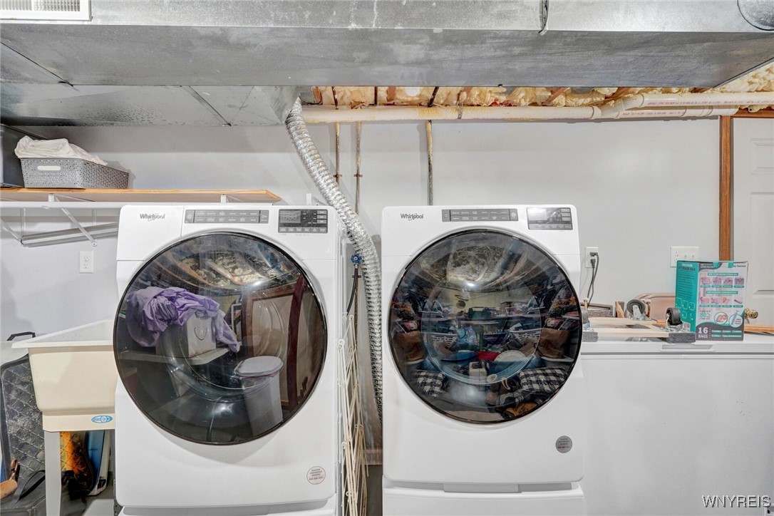 270 Buffalo Road, Unit 86 East Aurora, NY 14052 - Photo 15 of 30 Newer washer and gas dryer in basement