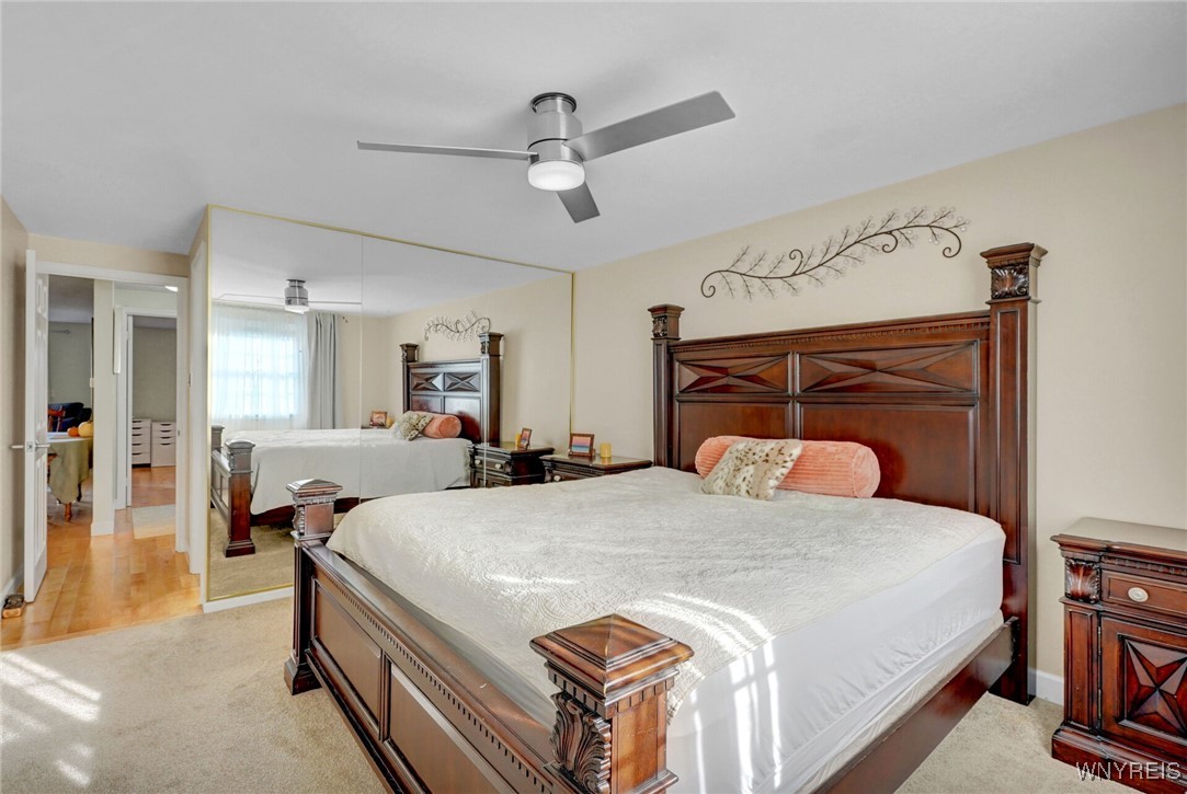 270 Buffalo Road, Unit 86 East Aurora, NY 14052 - Photo 7 of 30 Master bedroom, walk in closet