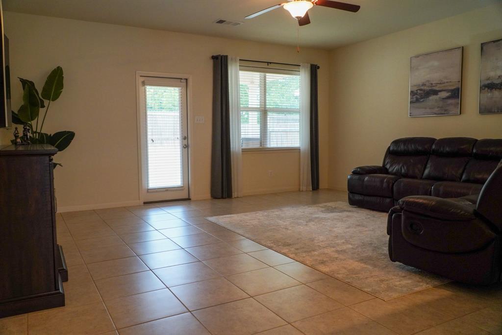 13624 Helix Bridge Way Crowley, TX 76036 - Photo 5 of 25 a living room with furniture and a window