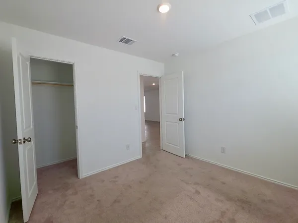 wooden floor and closet in a room