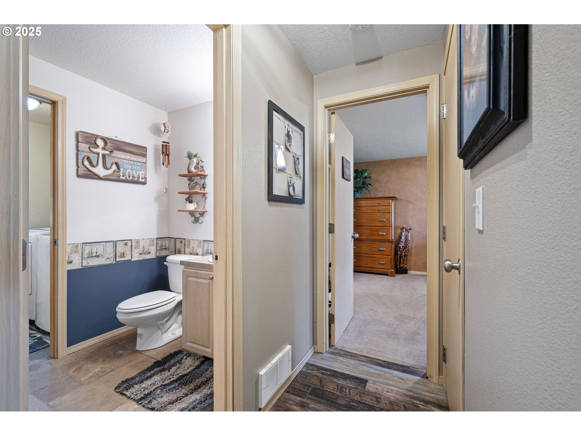 32968 Camas Swale Road Creswell, OR 97426 - Photo 19 of 44 a bathroom with a toilet sink and mirror