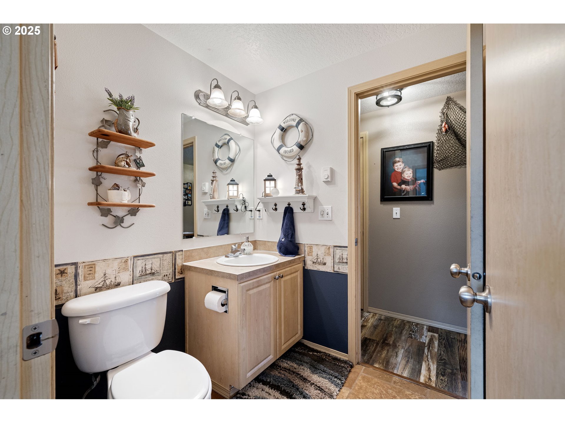32968 Camas Swale Road Creswell, OR 97426 - Photo 22 of 44 a bathroom with a toilet sink and mirror