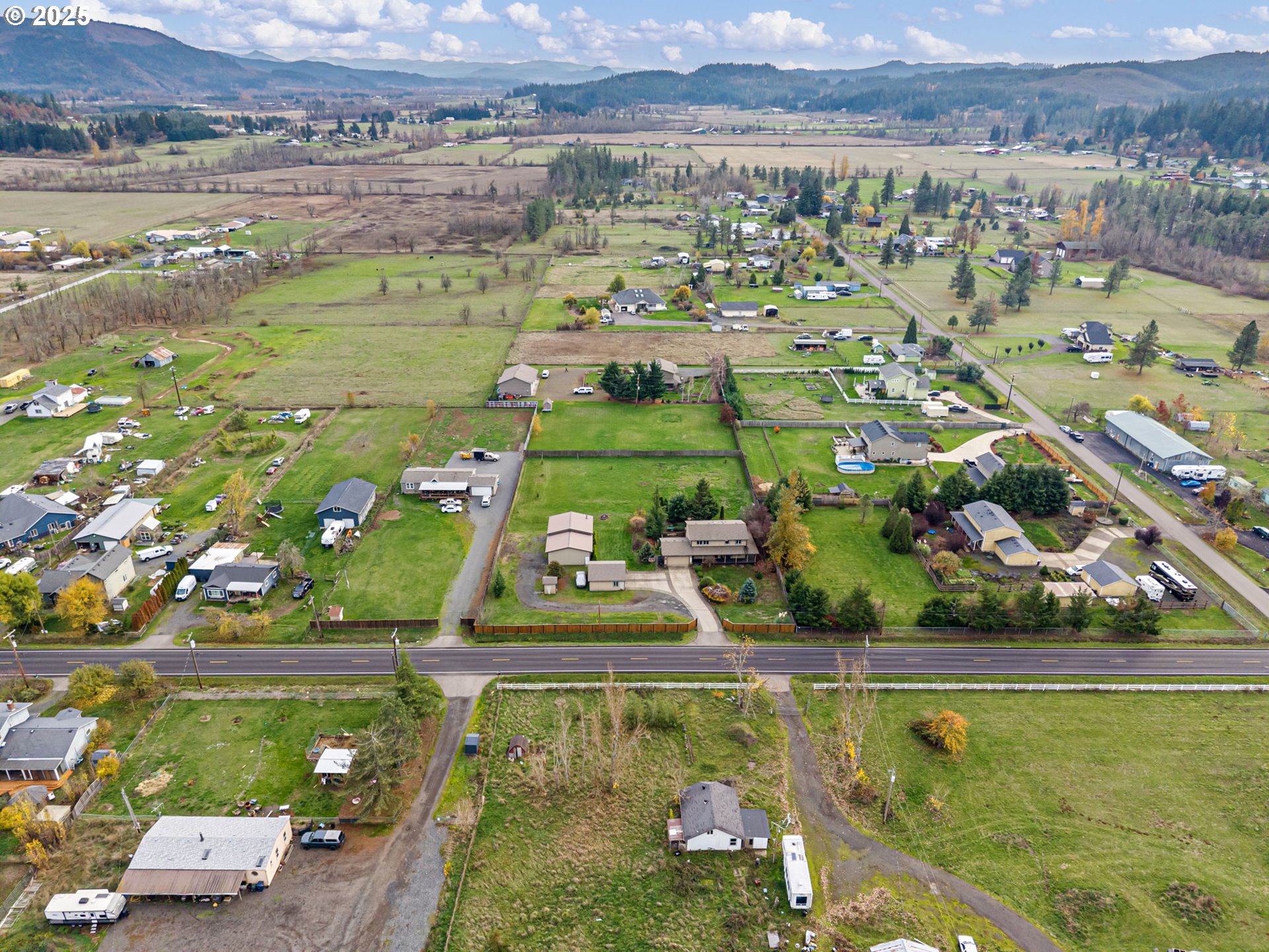 32968 Camas Swale Road Creswell, OR 97426 - Photo 40 of 44 a view of a city with lawn chairs