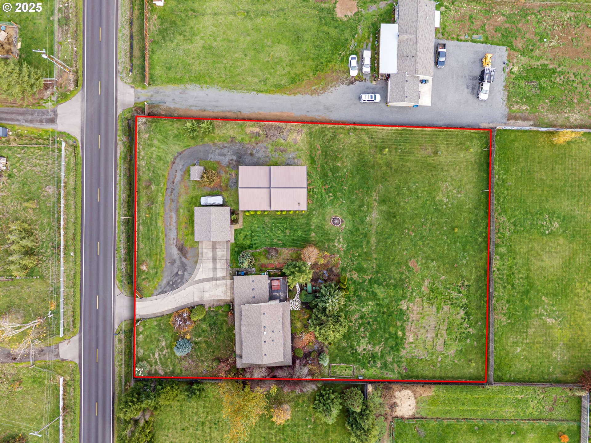 32968 Camas Swale Road Creswell, OR 97426 - Photo 42 of 44 an aerial view of a house with a yard