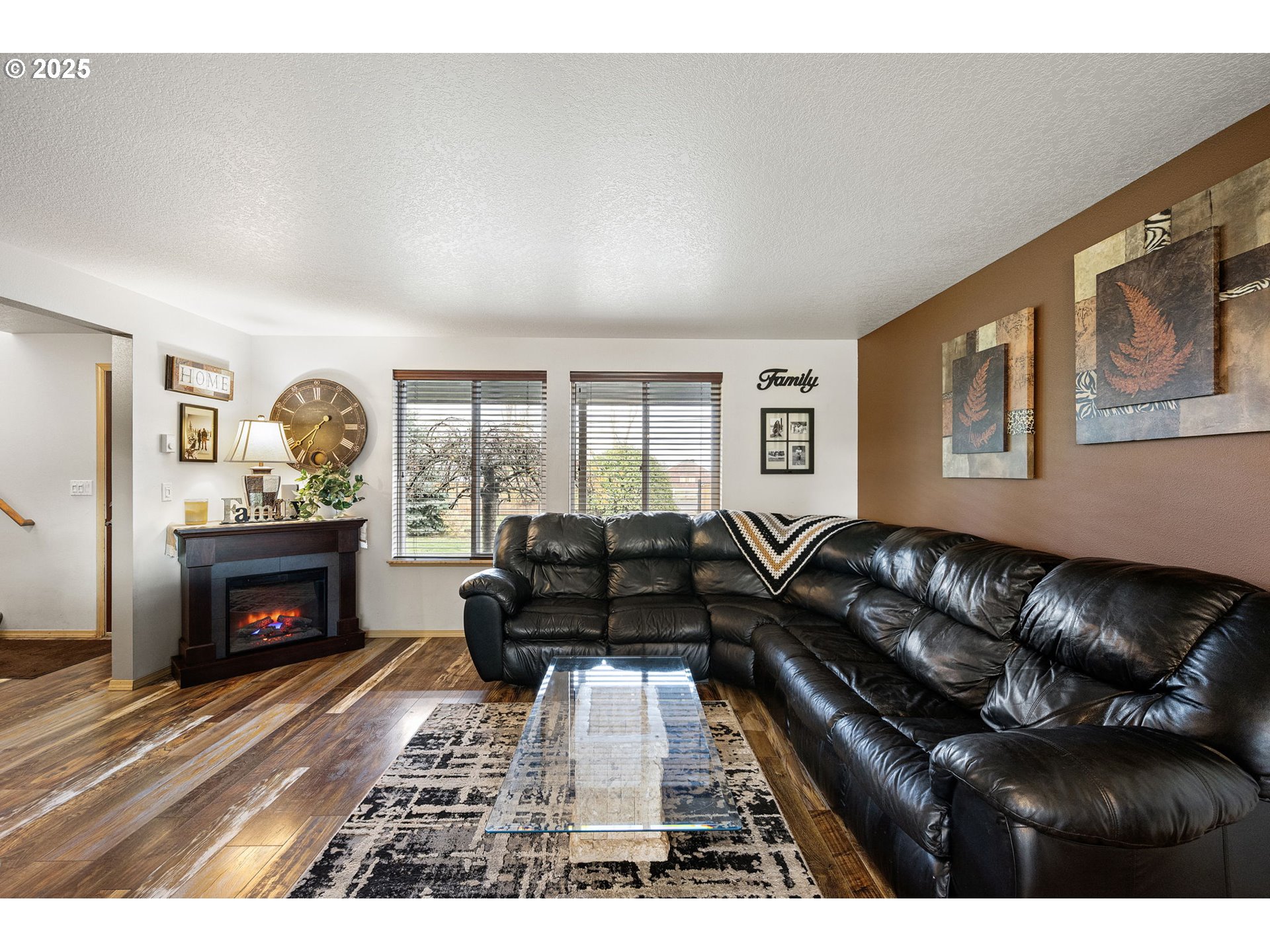 32968 Camas Swale Road Creswell, OR 97426 - Photo 7 of 44 a living room with furniture and a fireplace